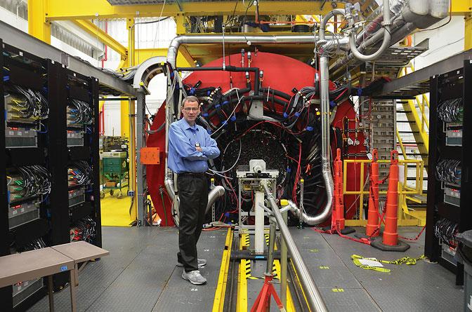 Curtis Meyer standing on the GlueX Platform